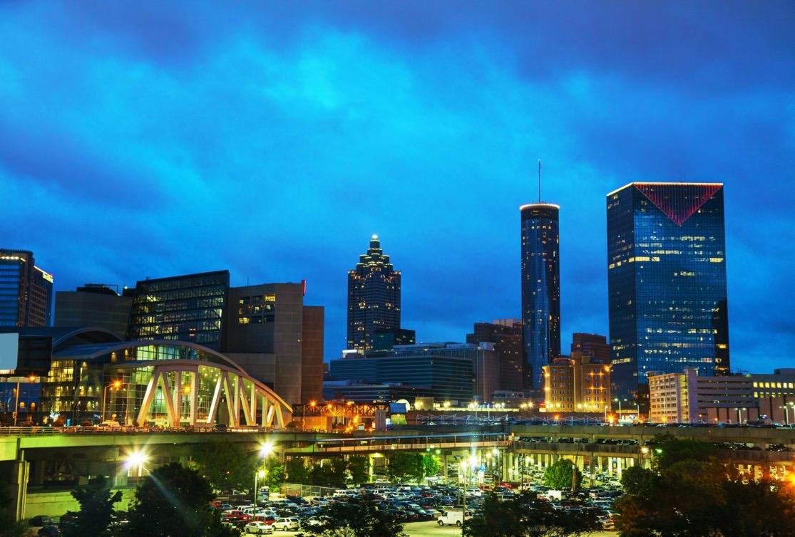 Downtown Atlanta office towers at dusk, part of the office market Swartz Co leases across